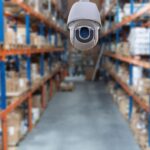 SIRA Approved CCTV Company in Dubai: Standards Followed by Top Installation Providers 3 SIRA Approved CCTV Company in Dubai installing compliant surveillance system in warehouse